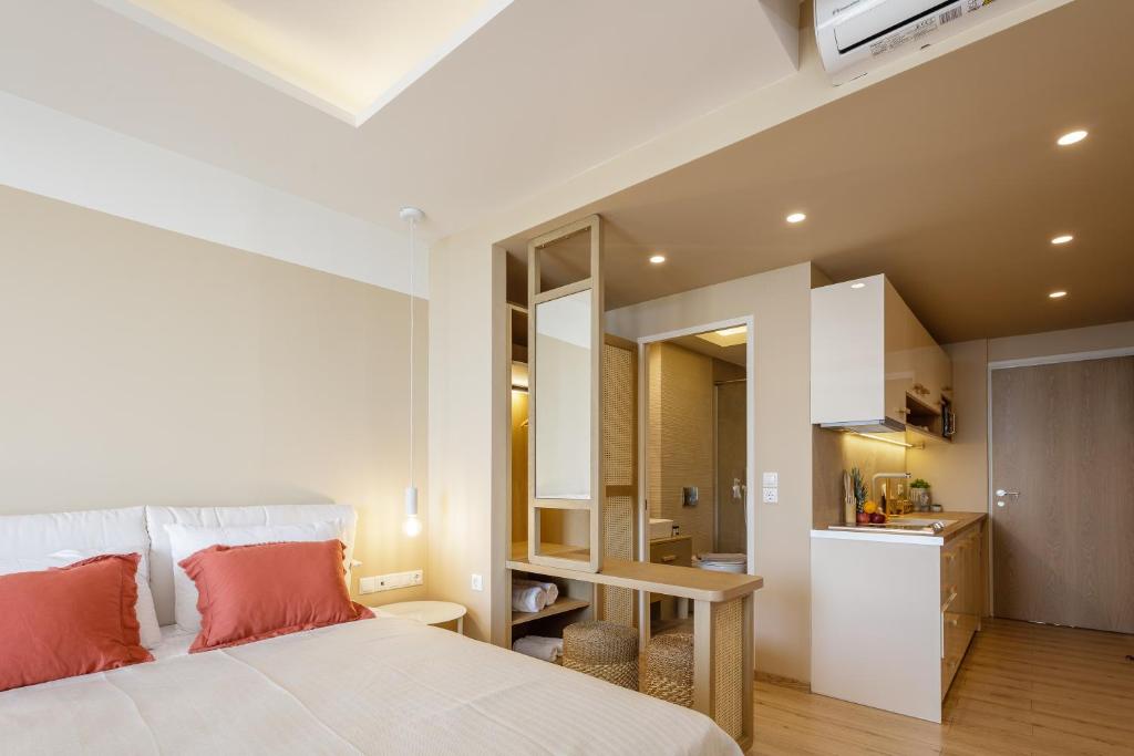 Posteľ alebo postele v izbe v ubytovaní La Vie En Mer Apartments