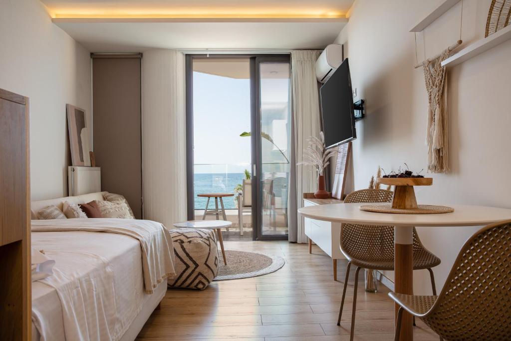Posteľ alebo postele v izbe v ubytovaní La Vie En Mer Apartments