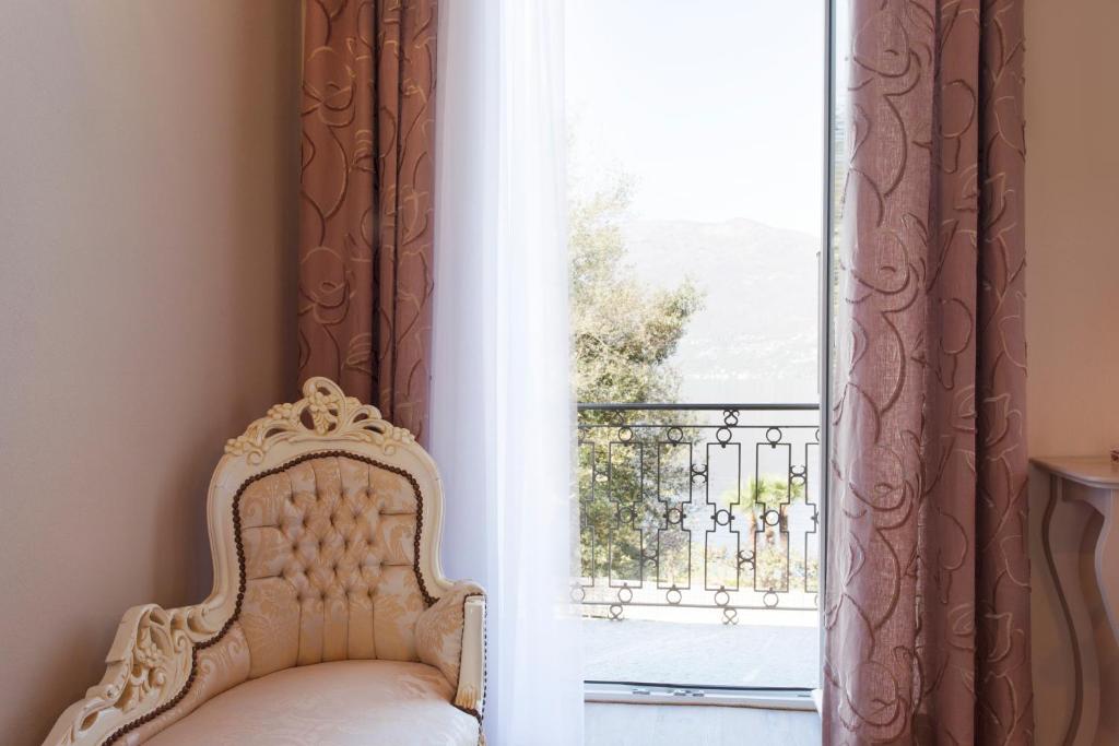 Postel nebo postele na pokoji v ubytování Boutique Hotel Villa Sarnia