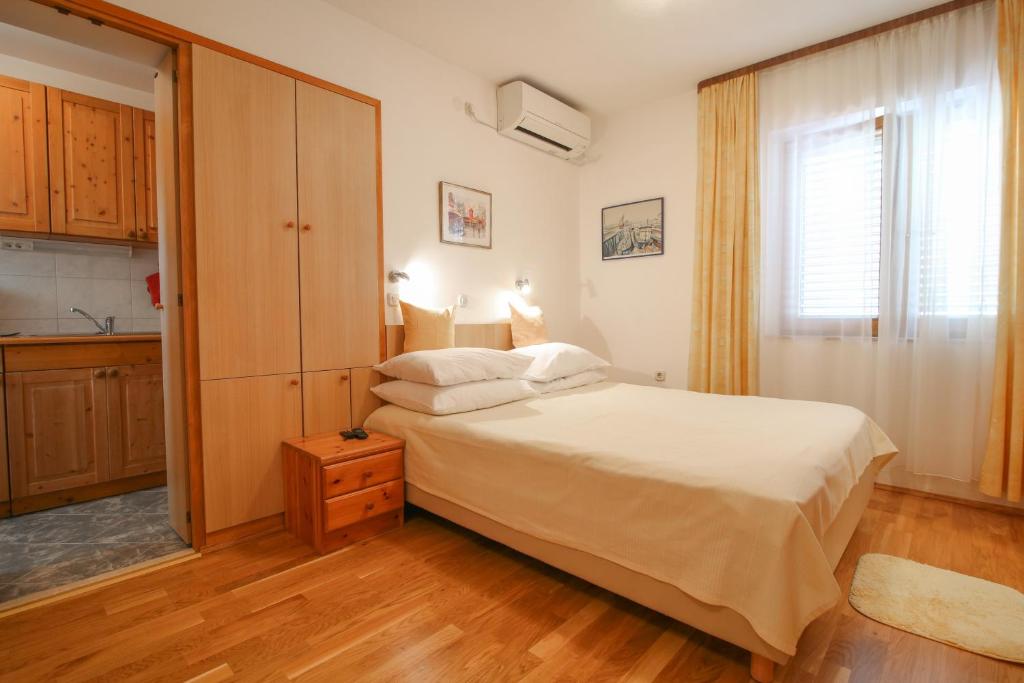 Posteľ alebo postele v izbe v ubytovaní SUNshine