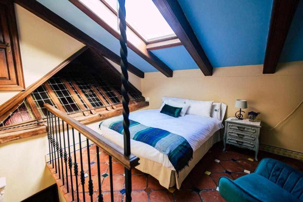Posteľ alebo postele v izbe v ubytovaní La casa del Cipres una casa con historia