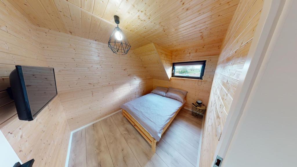 Telewizja i/lub zestaw kina domowego w obiekcie Domki Kalimera