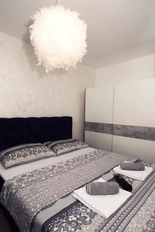 Posteľ alebo postele v izbe v ubytovaní Duce Apartment Mendula