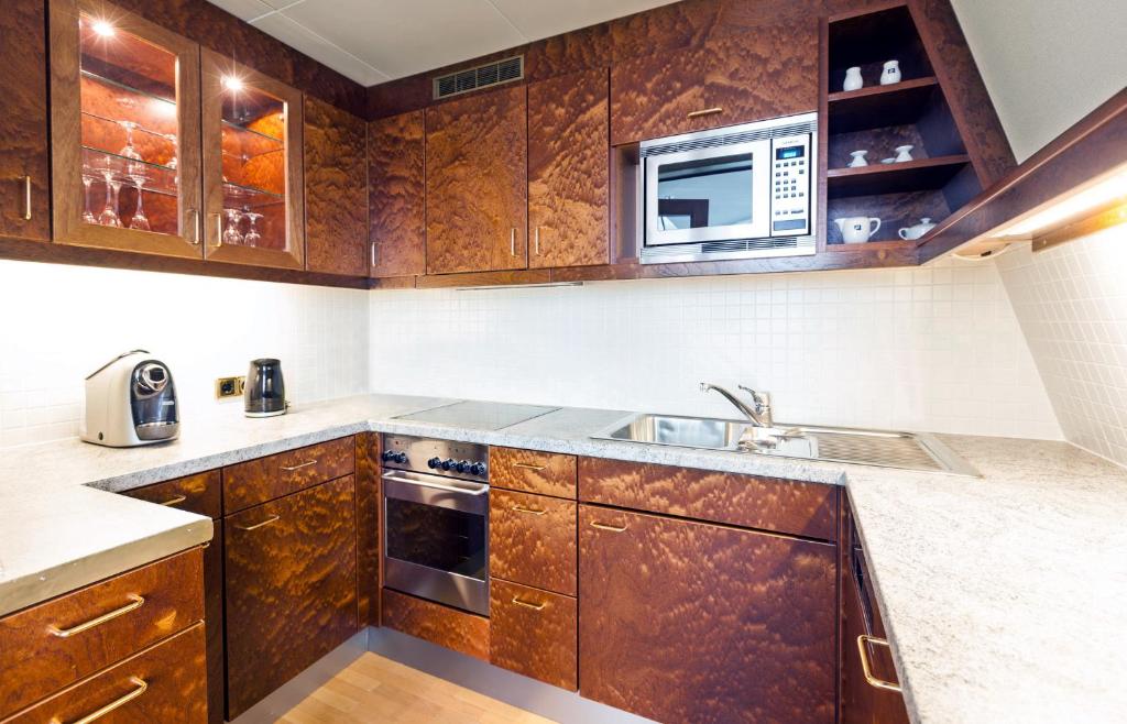 Kuchyň nebo kuchyňský kout v ubytování Living Hotel Großer Kurfürst