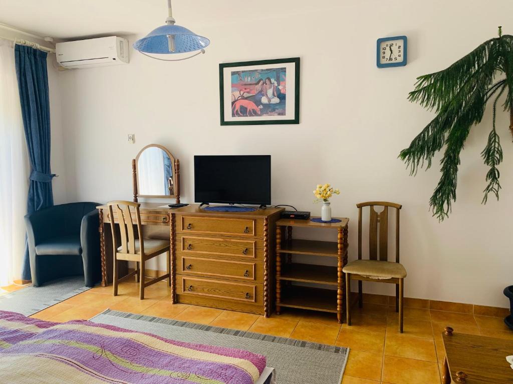 TV a/nebo společenská místnost v ubytování Gulyás Vendégház