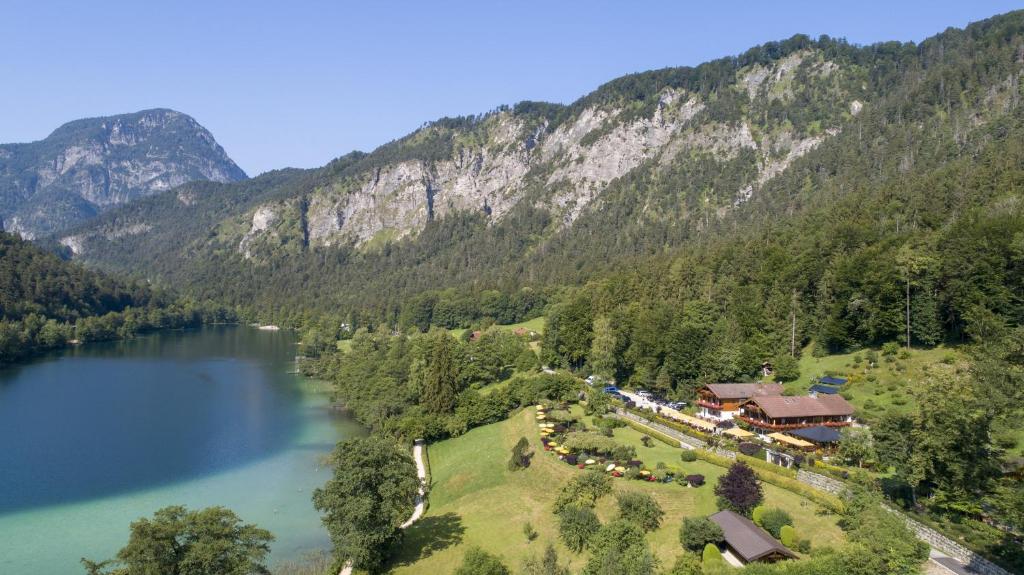 an aerial view of a resort next to a lake at Hotel Pension Hubertus in Bad Reichenhall
