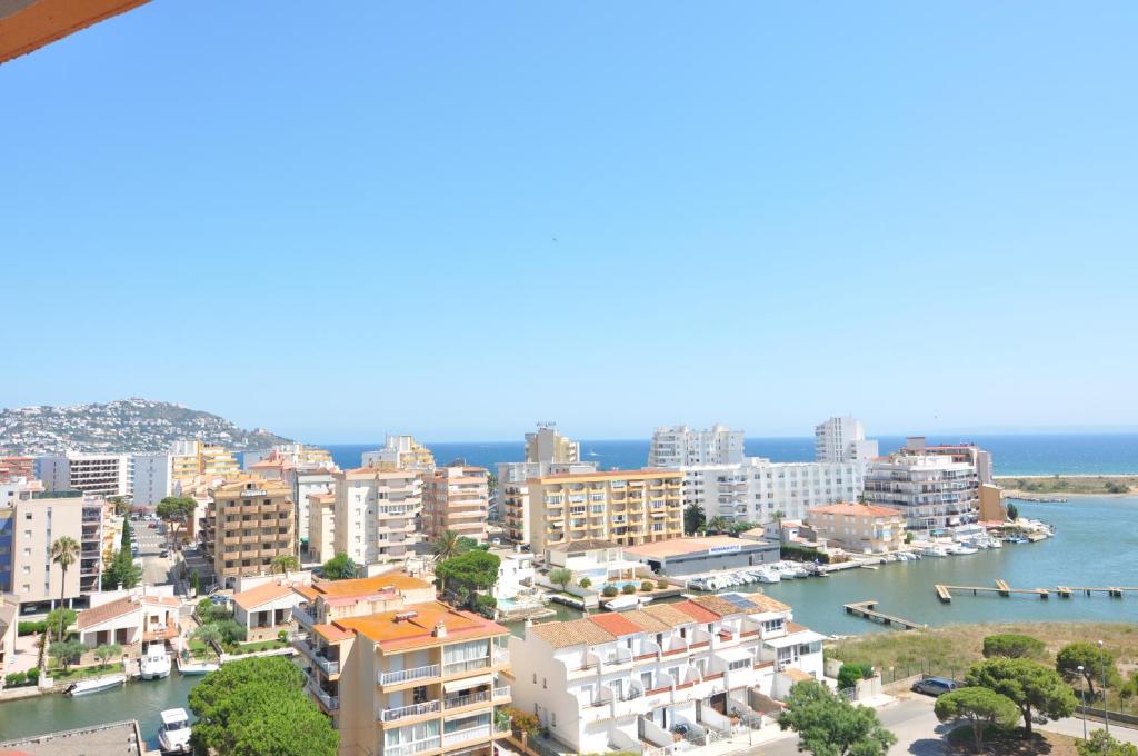 a view of a city with buildings and the water at RNET - IR29218 Studios Roses Costa Brava in Roses