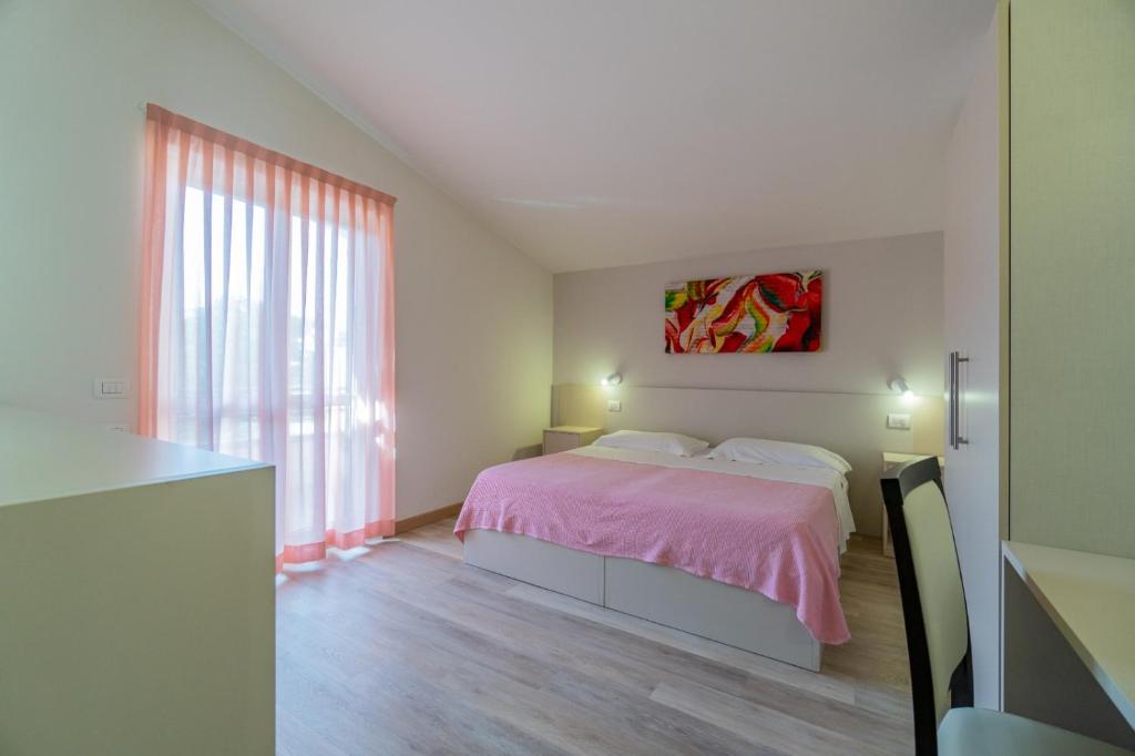 Postel nebo postele na pokoji v ubytování Hotel Bellavista
