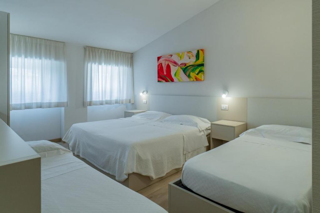 Postel nebo postele na pokoji v ubytování Hotel Bellavista