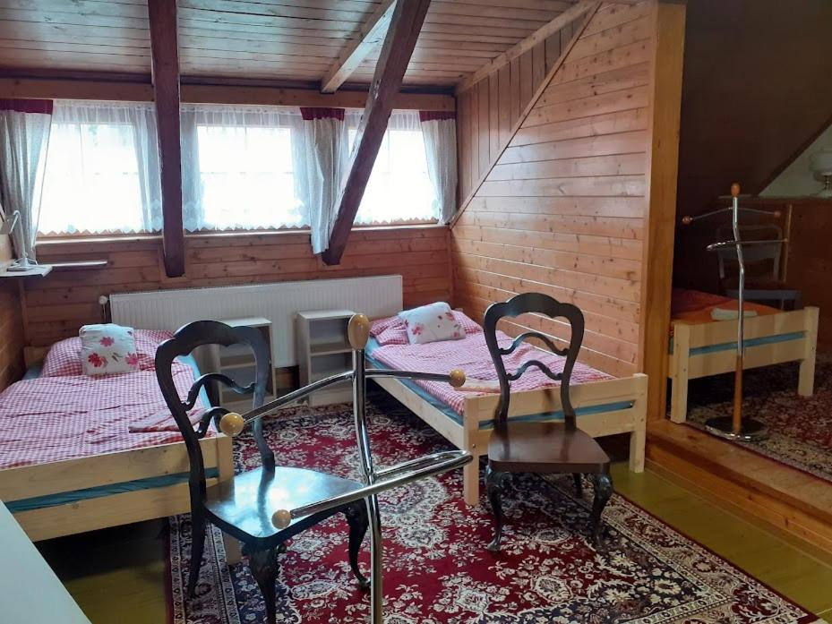 Postel nebo postele na pokoji v ubytování Penzion Na Zámostí Malenice