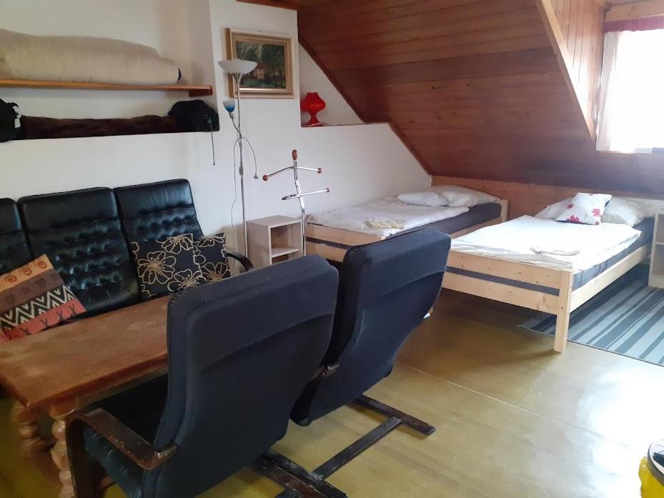 Postel nebo postele na pokoji v ubytování Penzion Na Zámostí Malenice