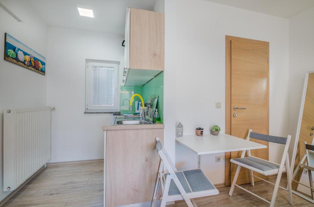 Kuchyňa alebo kuchynka v ubytovaní Apartment Stella di Mare