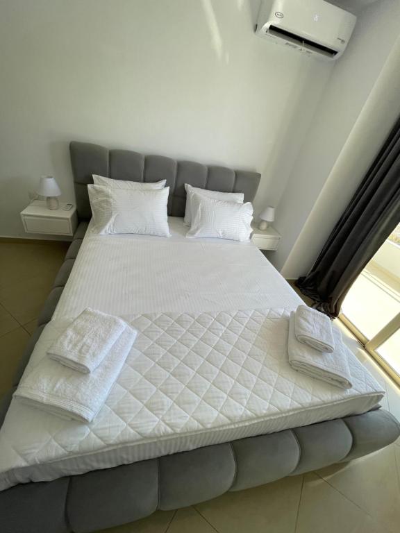 Postel nebo postele na pokoji v ubytování Hotel Mane