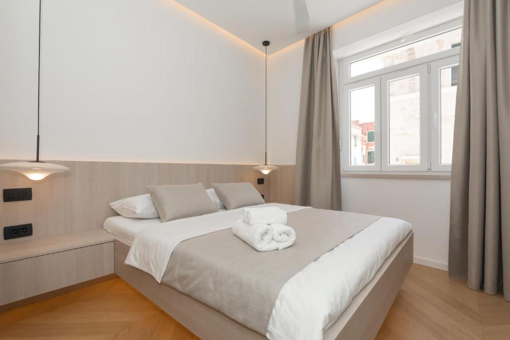 Posteľ alebo postele v izbe v ubytovaní Étoile apartment