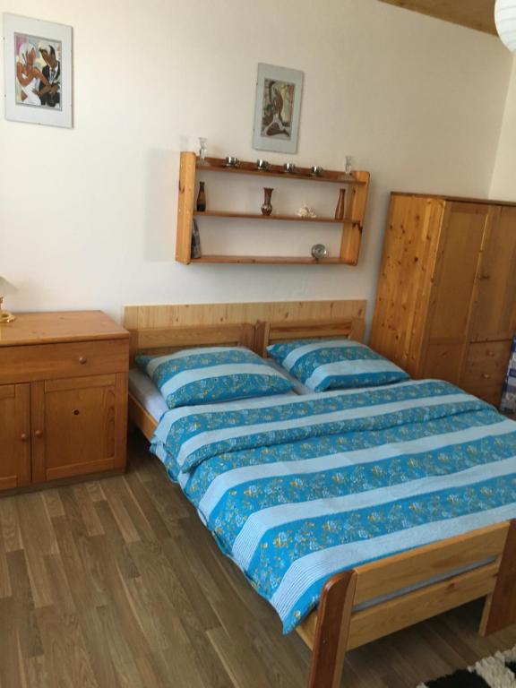 Postel nebo postele na pokoji v ubytování Chalupa a apartmány Morajda