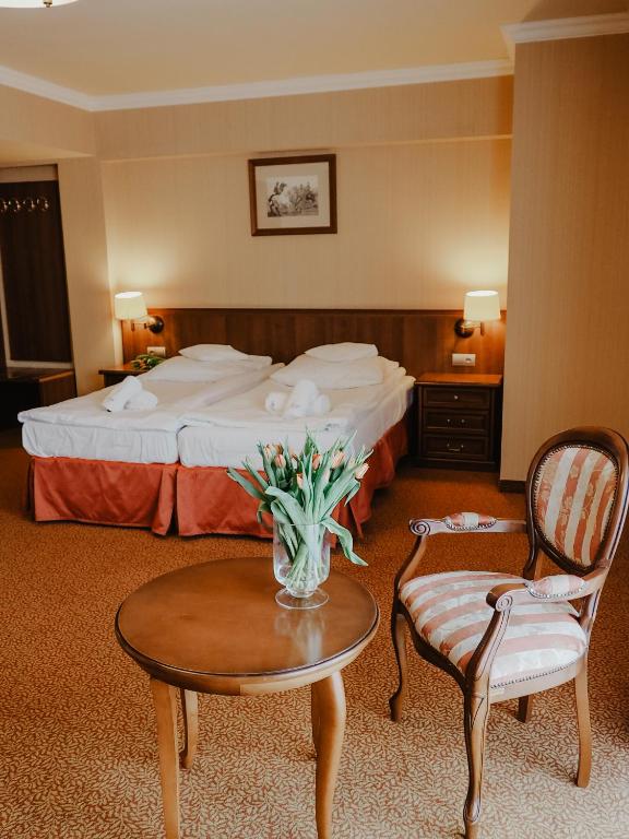 Postel nebo postele na pokoji v ubytování Hotel Delfin Spa&wellness