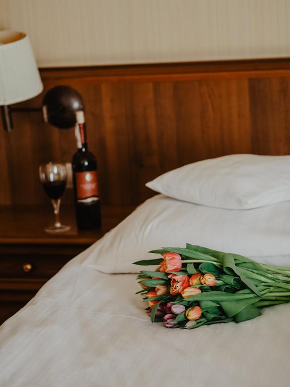 Postel nebo postele na pokoji v ubytování Hotel Delfin Spa&wellness