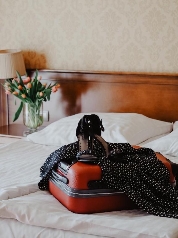 Postel nebo postele na pokoji v ubytování Hotel Delfin Spa&wellness