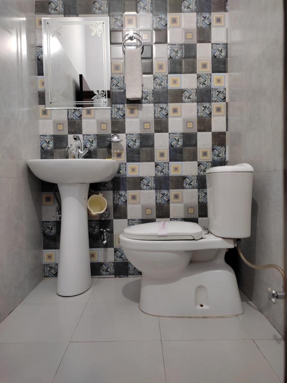 Koupelna v ubytování Hotel Krishna Ji