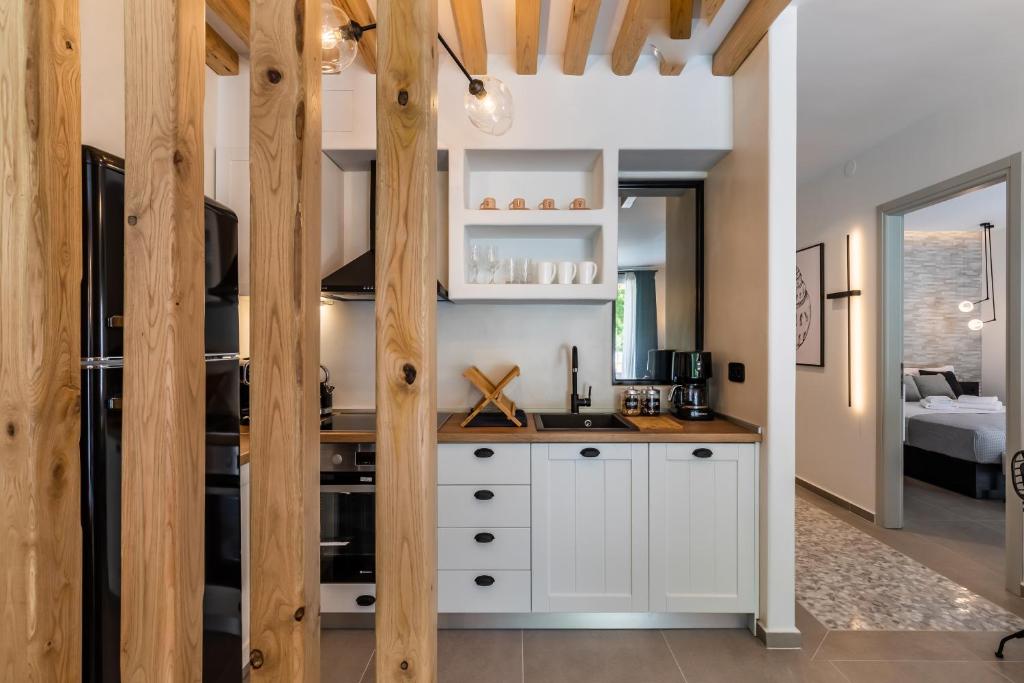 Kuchyň nebo kuchyňský kout v ubytování AGNONTAS LUXURY VILLAS