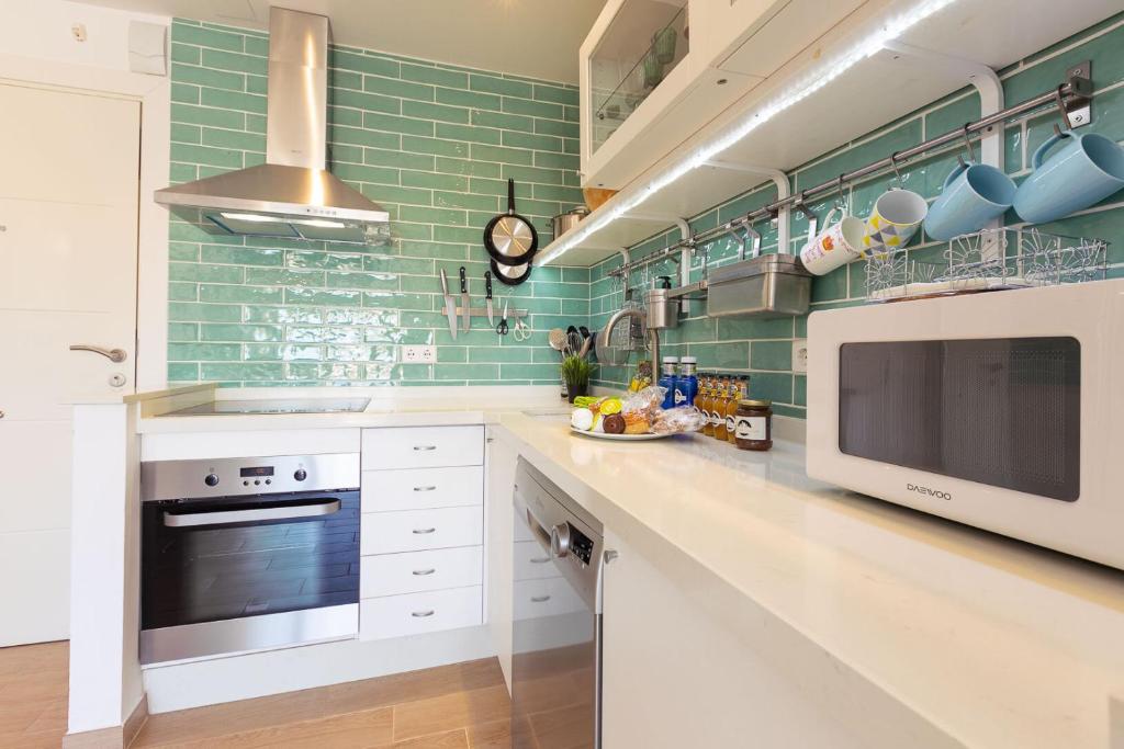 Kuchyňa alebo kuchynka v ubytovaní Apartamento La Golondrina