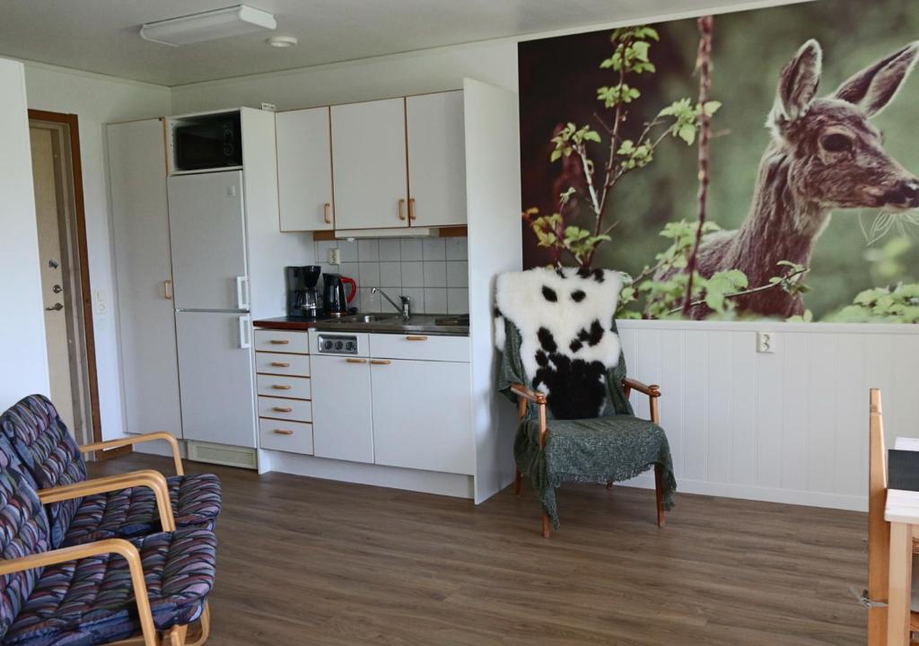 Kuchyň nebo kuchyňský kout v ubytování HusHotellHunge AB