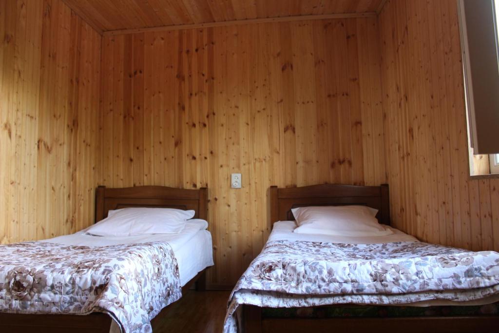Postel nebo postele na pokoji v ubytování Guesthouse Marshan
