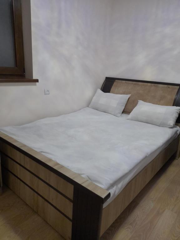 Postel nebo postele na pokoji v ubytování Arman's House Sevan