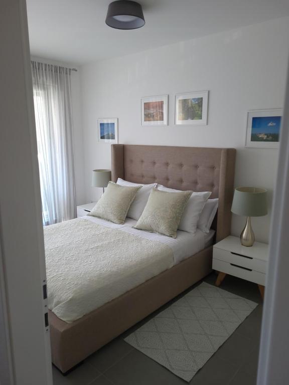 Postel nebo postele na pokoji v ubytování Apartment Kiara