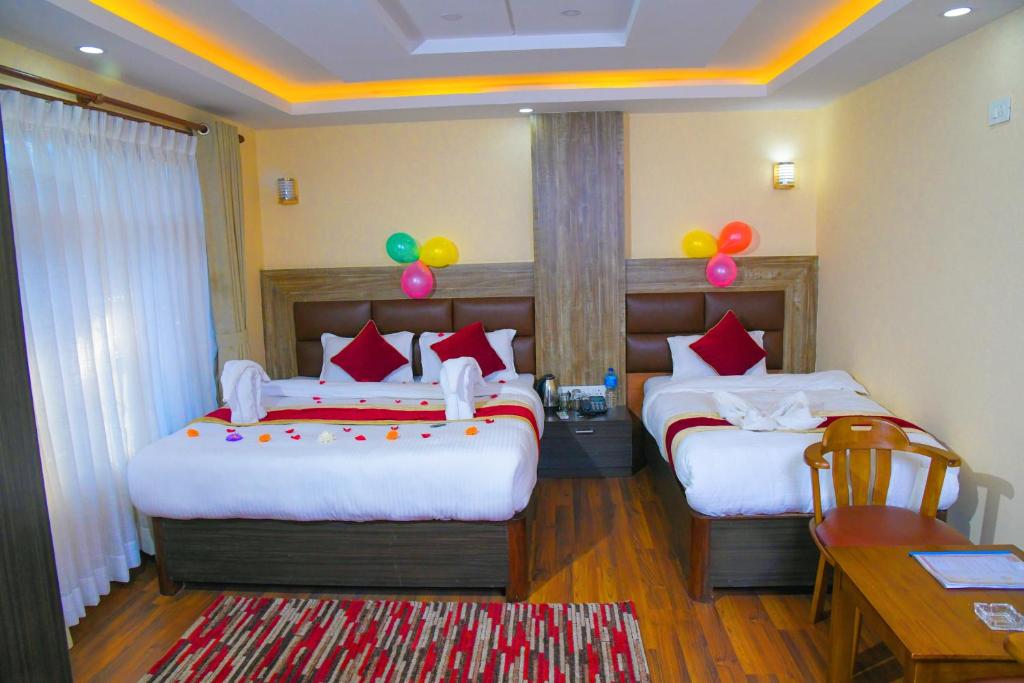 Postel nebo postele na pokoji v ubytování Hotel Airport Deepshree