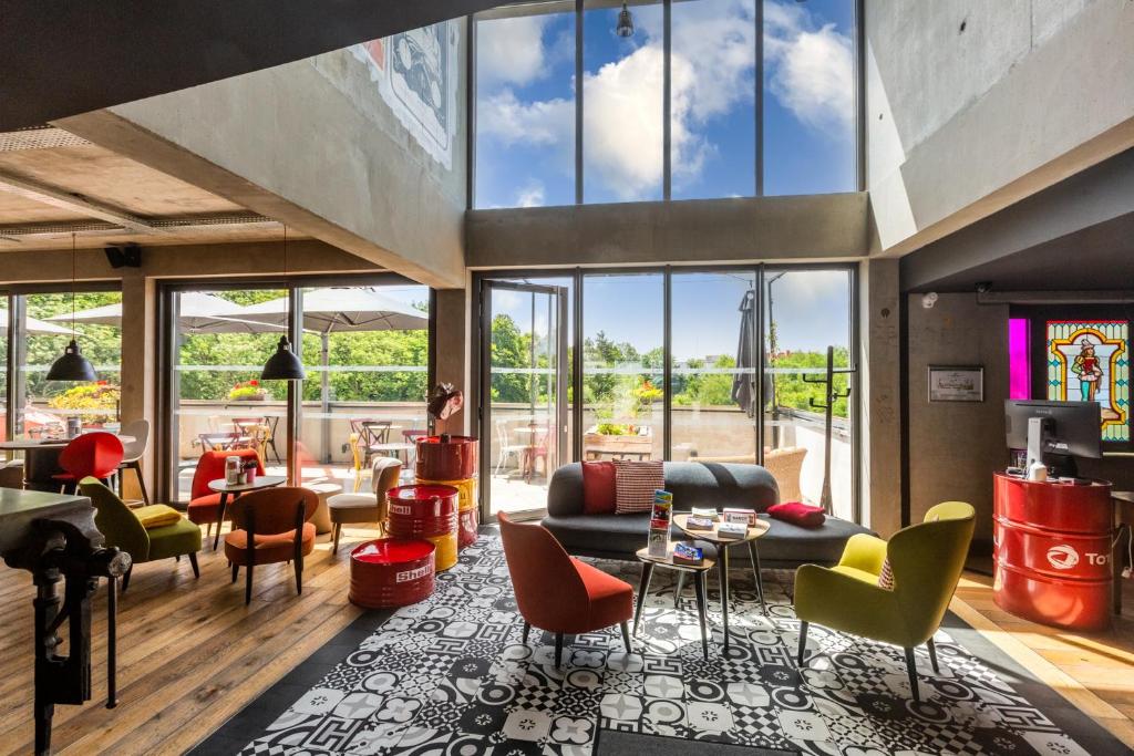Posezení v ubytování Lorraine Hôtel Nancy Ouest - Laxou