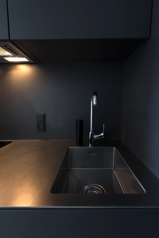 Kuchyň nebo kuchyňský kout v ubytování CPH Studio Hotel
