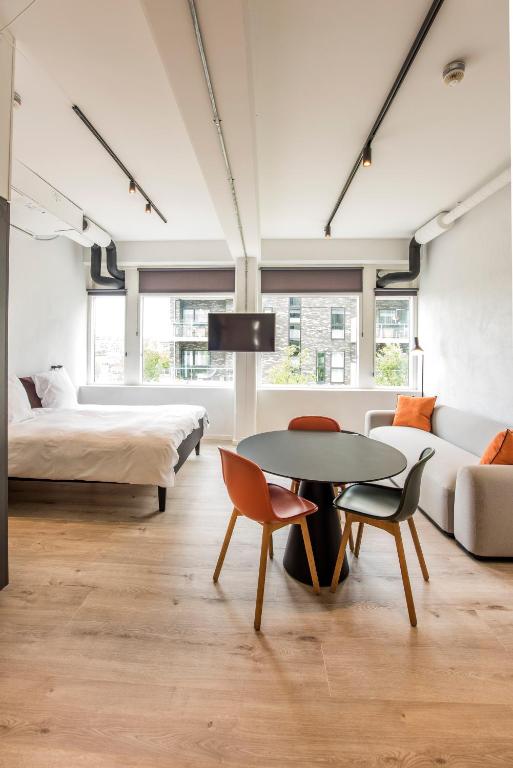 Postel nebo postele na pokoji v ubytování CPH Studio Hotel