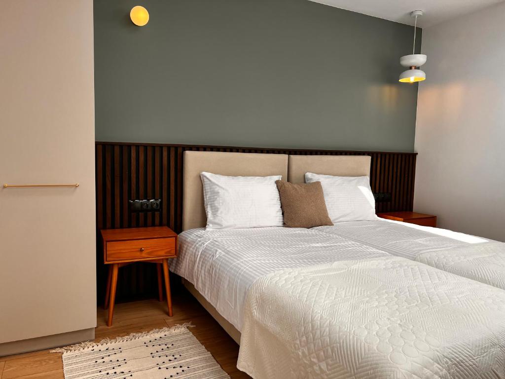 Posteľ alebo postele v izbe v ubytovaní Monciak55 Sopot Apartments