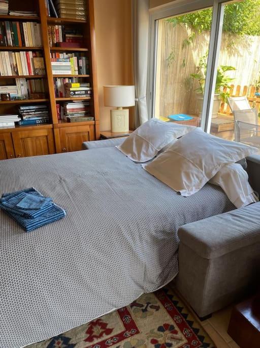 Posteľ alebo postele v izbe v ubytovaní Gîte les Noisetiers Maison familiale avec piscine