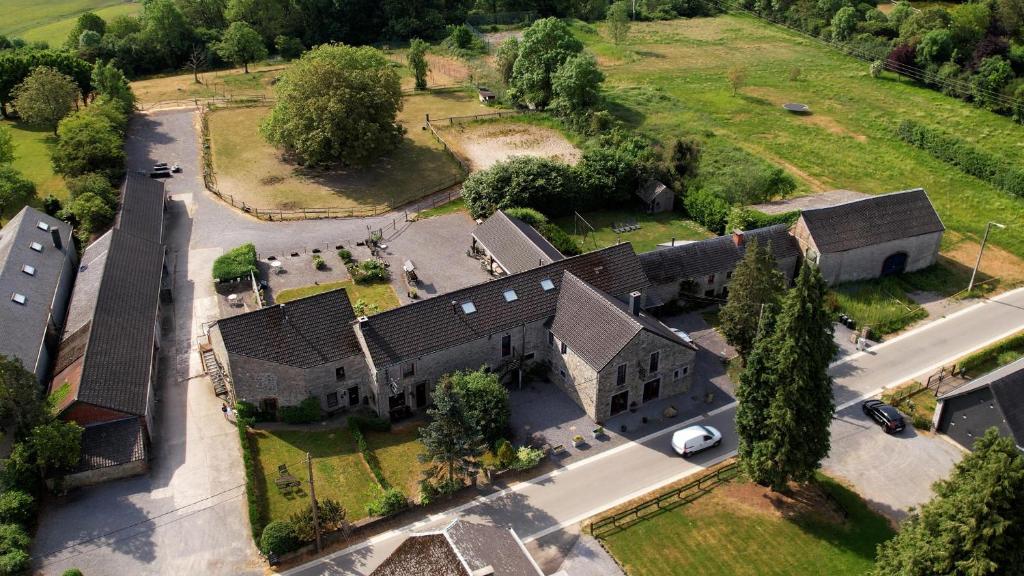 an overhead view of a large house with a yard at La Ferme De Durbuy in Durbuy