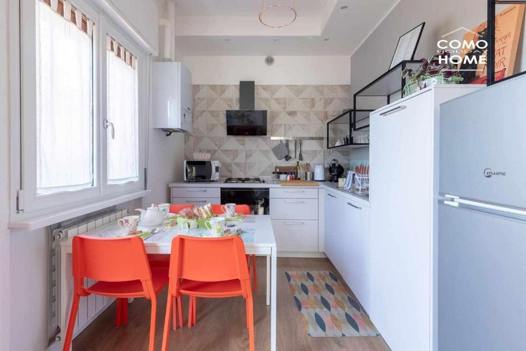 Kuchyňa alebo kuchynka v ubytovaní Como Holiday Home Appartamento ideale per famiglie