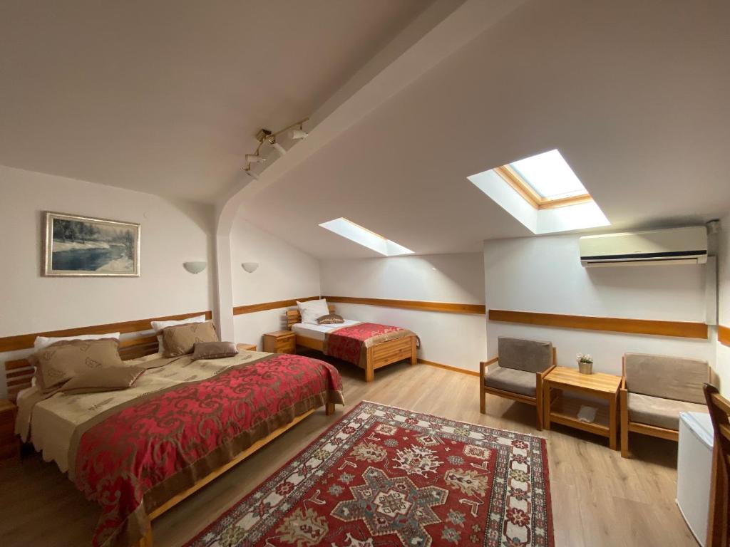 Postel nebo postele na pokoji v ubytování Hotel Berr