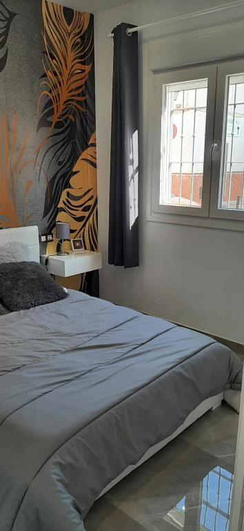 Posteľ alebo postele v izbe v ubytovaní APARTAMENTO CENTRICO