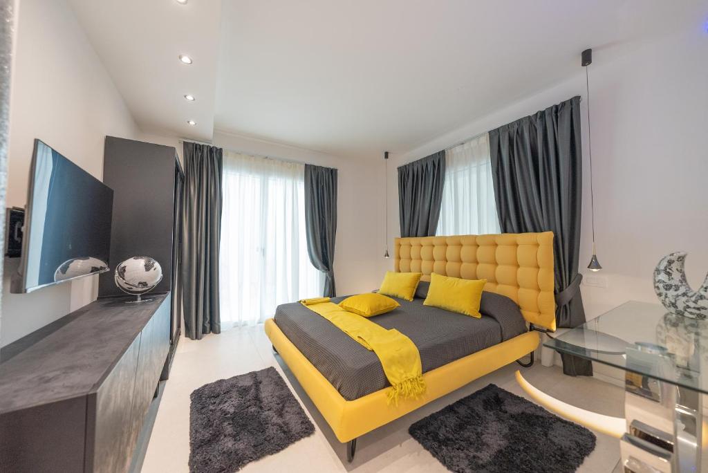 Televízia a/alebo spoločenská miestnosť v ubytovaní Magic Luxury Apartments