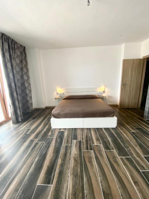 Postel nebo postele na pokoji v ubytování Manfredi Sea Room