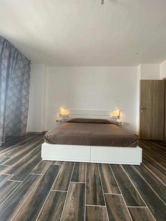 Postel nebo postele na pokoji v ubytování Manfredi Sea Room