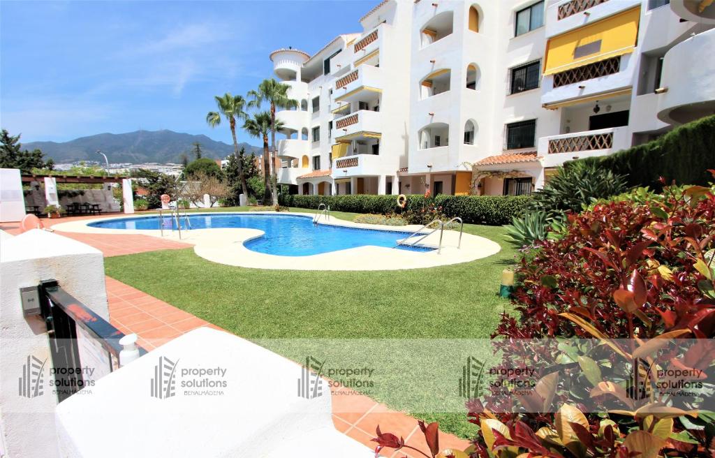 Bazén v ubytování Pueblo Del Parque 2 - Soleada terraza con jardín - Piscina y Playa nebo v jeho okolí
