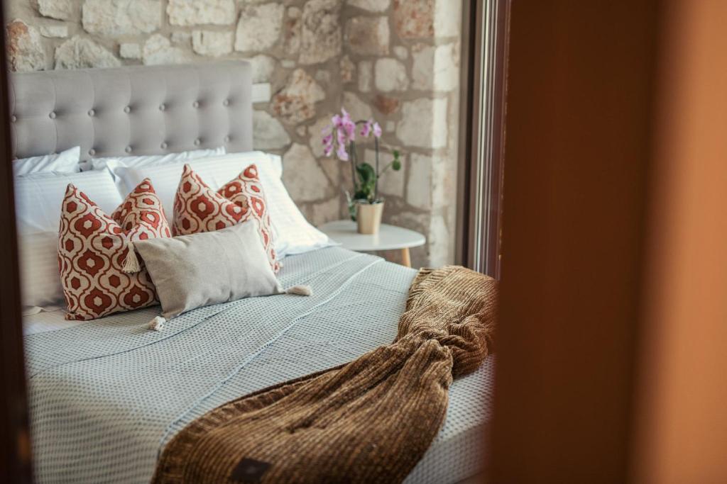 Postel nebo postele na pokoji v ubytování Neva Villa