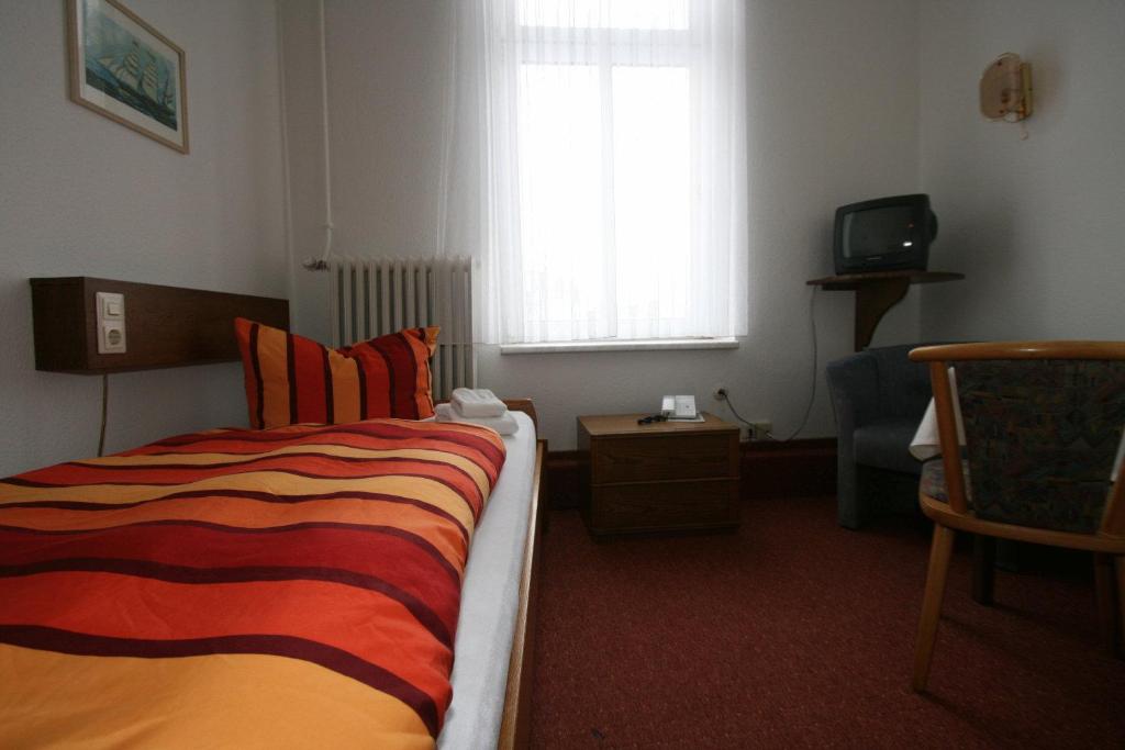Postel nebo postele na pokoji v ubytování Hotel Rummeni
