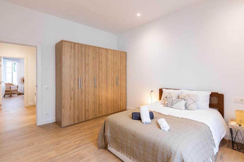 A bed or beds in a room at Lujo, comodidad y espacio Gijon centro