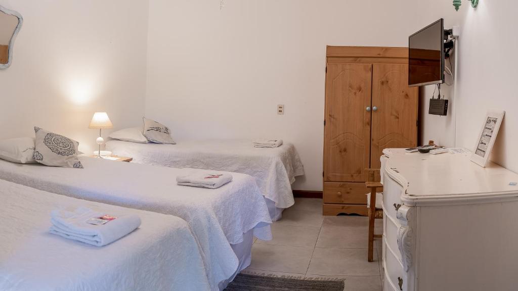 Postel nebo postele na pokoji v ubytování Posada de la Flor