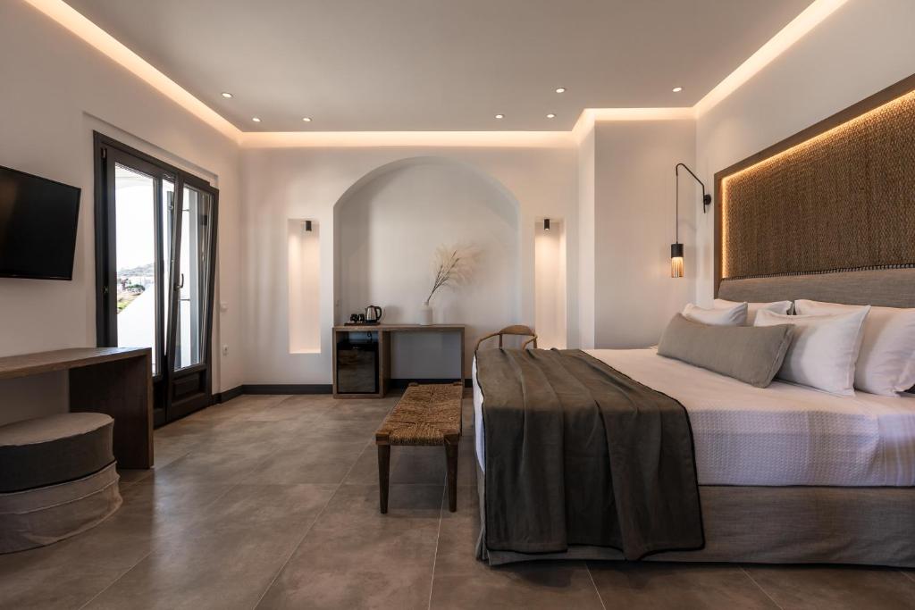 Postel nebo postele na pokoji v ubytování Vineyard Exclusive Suites