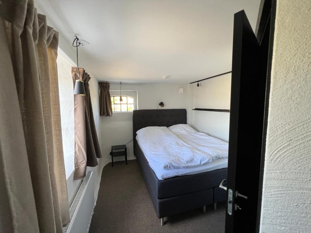 Postel nebo postele na pokoji v ubytování Backadal Gård BnB