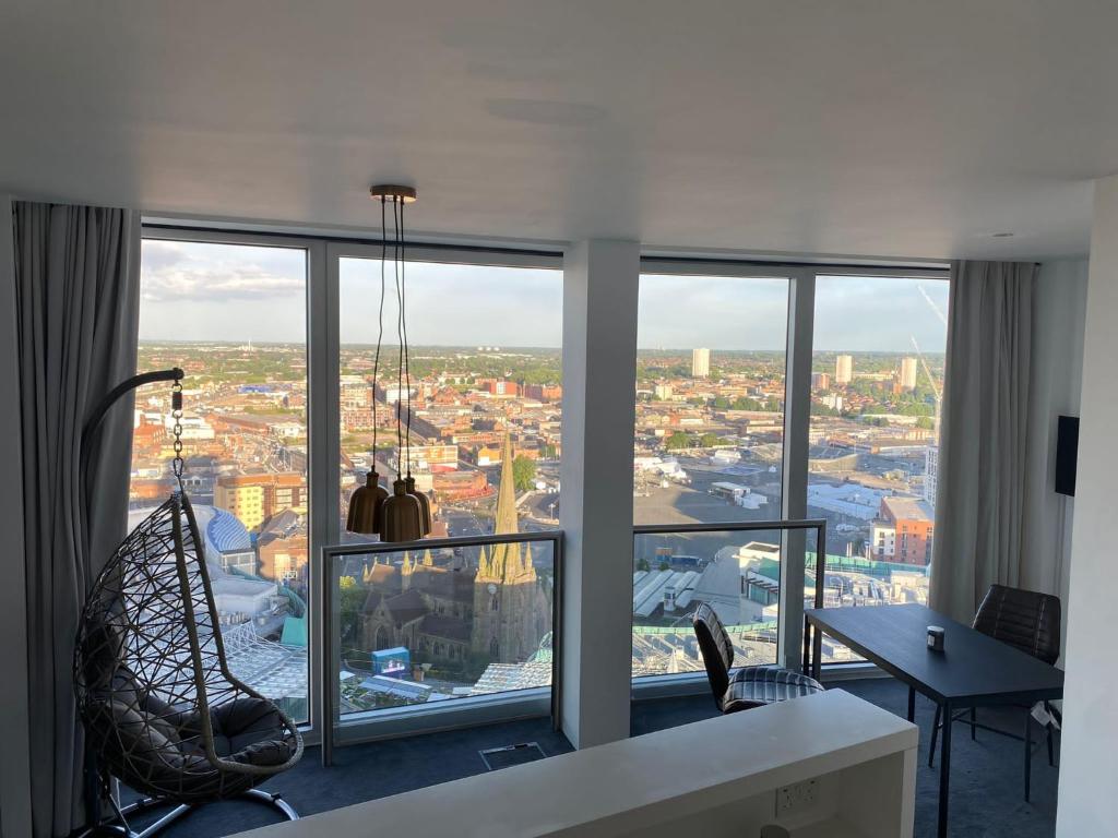 a living room with a view of a city at Rotunda - New Street, City Centre, Birmingham in Birmingham